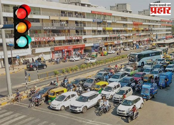 Nashik News : नाशिककरांची उन्हाच्या चटक्यांमुळे सिग्नलवर थांबण्याची दमछाक!