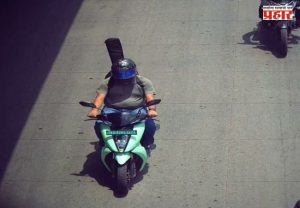 Bengaluru AI camera : शेवटी AI चुकलंच! गिटारला हेल्मेटविना सहप्रवासी समजून ठोठावला ₹500 चा दंड; नेमकं प्रकरण काय?